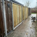 Schutting met poort